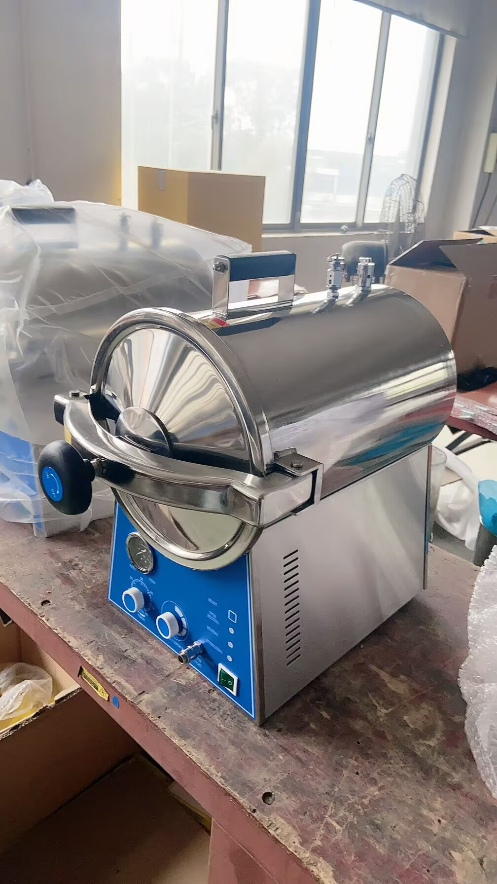 Compact TS-B24 dental sterilizer with digital display and stainless steel construction